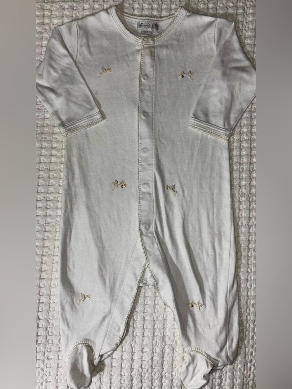 White Footed Baby Sleeper with stork embroidery. 
NWOT 
6-9 months